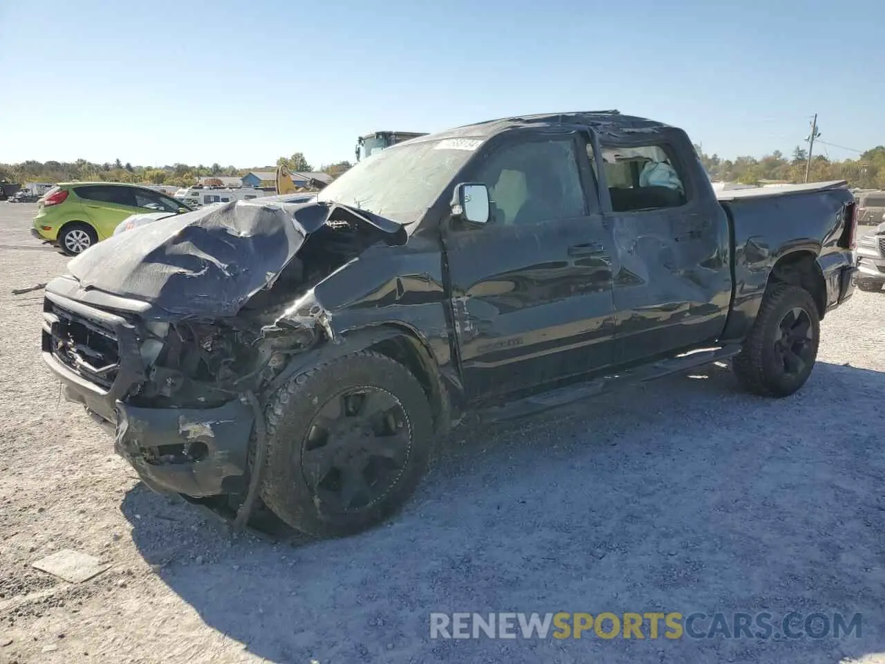 1 Photograph of a damaged car 1C6SRFFT4KN583771 RAM 1500 2019