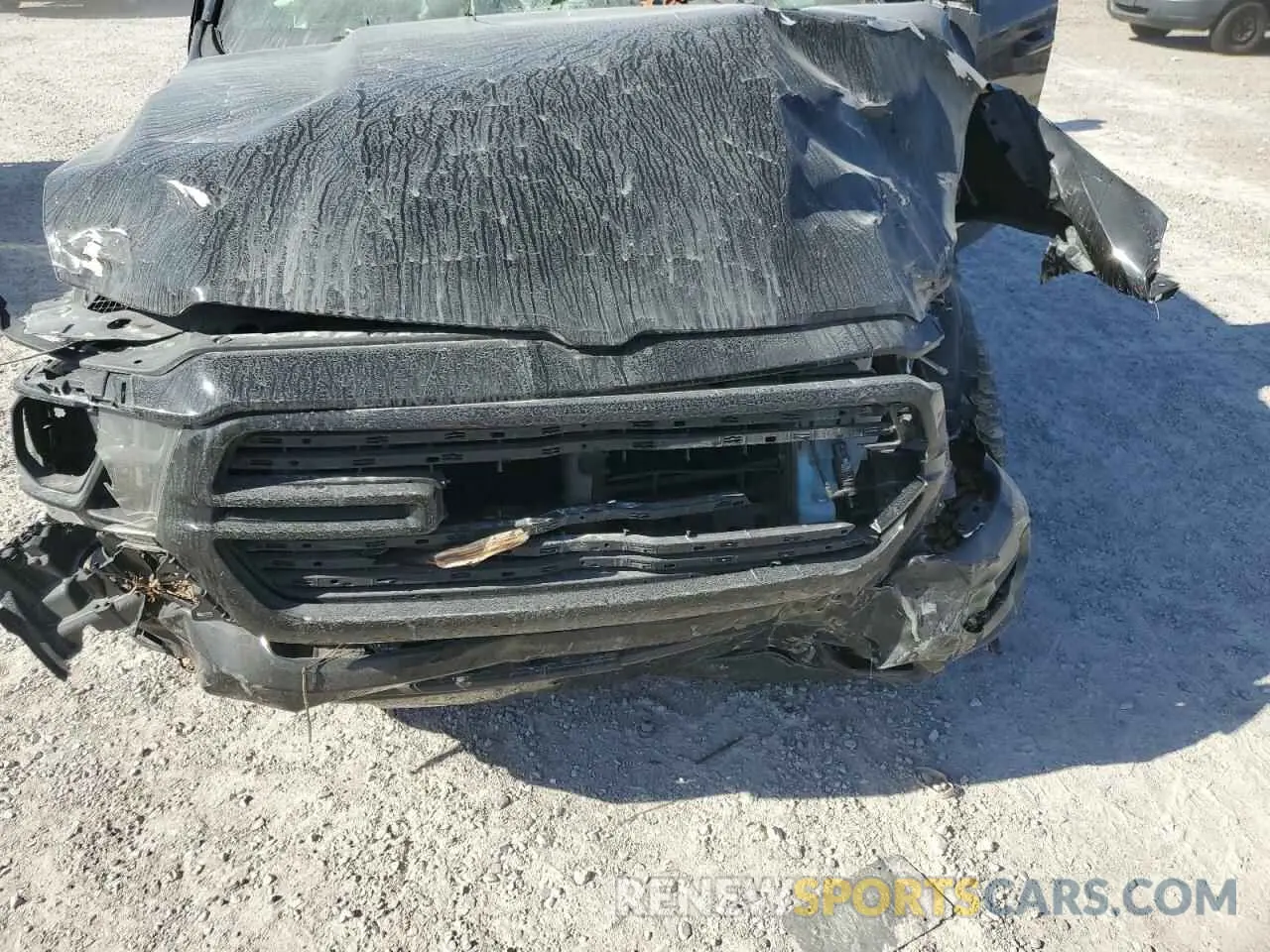11 Photograph of a damaged car 1C6SRFFT4KN583771 RAM 1500 2019