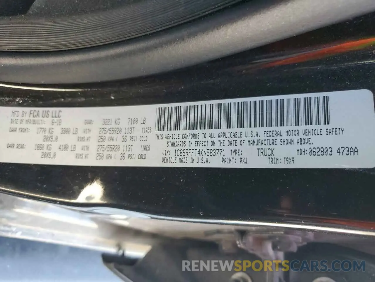 12 Photograph of a damaged car 1C6SRFFT4KN583771 RAM 1500 2019