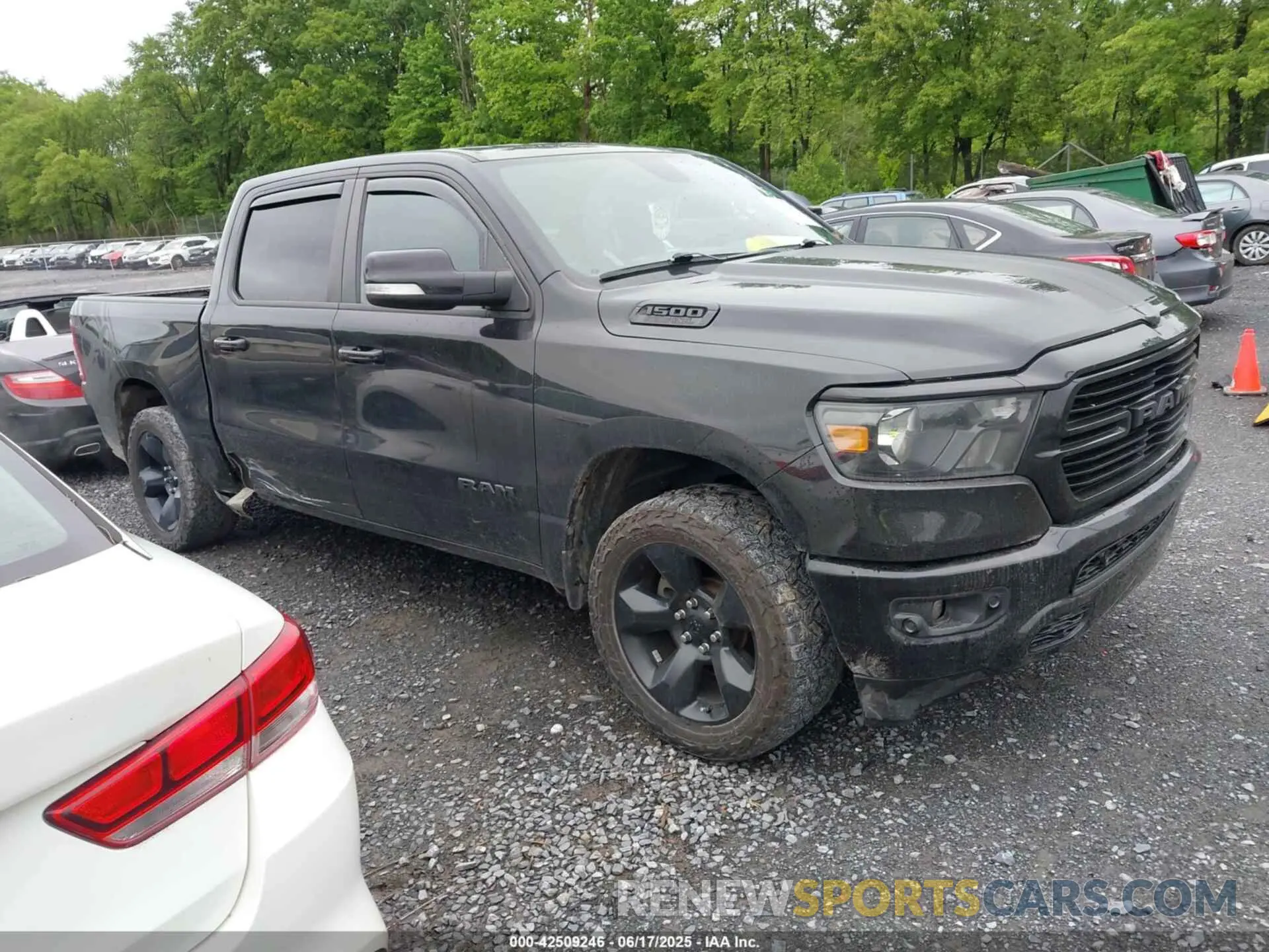 1 Photograph of a damaged car 1C6SRFFT4KN782464 RAM 1500 2019
