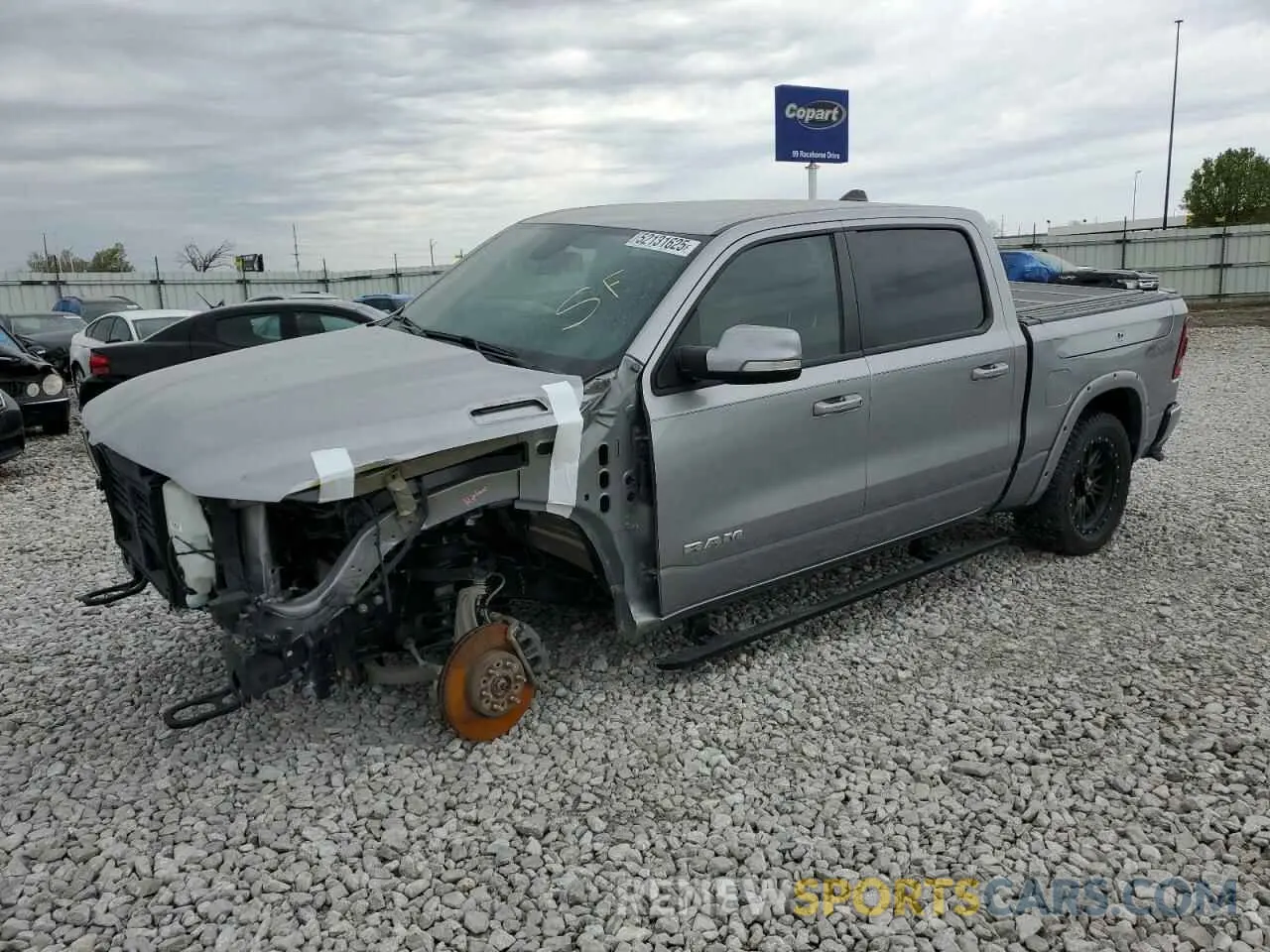 1 Photograph of a damaged car 1C6SRFFT4KN819318 RAM 1500 2019