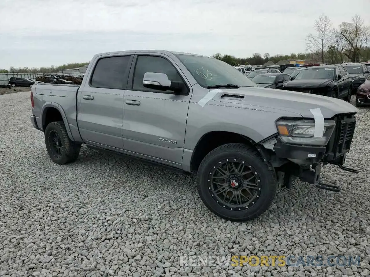 4 Photograph of a damaged car 1C6SRFFT4KN819318 RAM 1500 2019