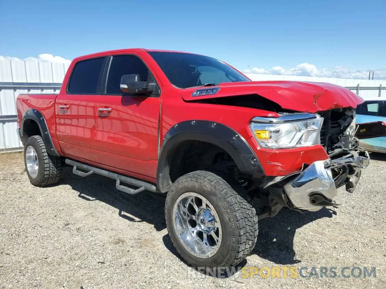 4 Photograph of a damaged car 1C6SRFFT4KN842212 RAM 1500 2019