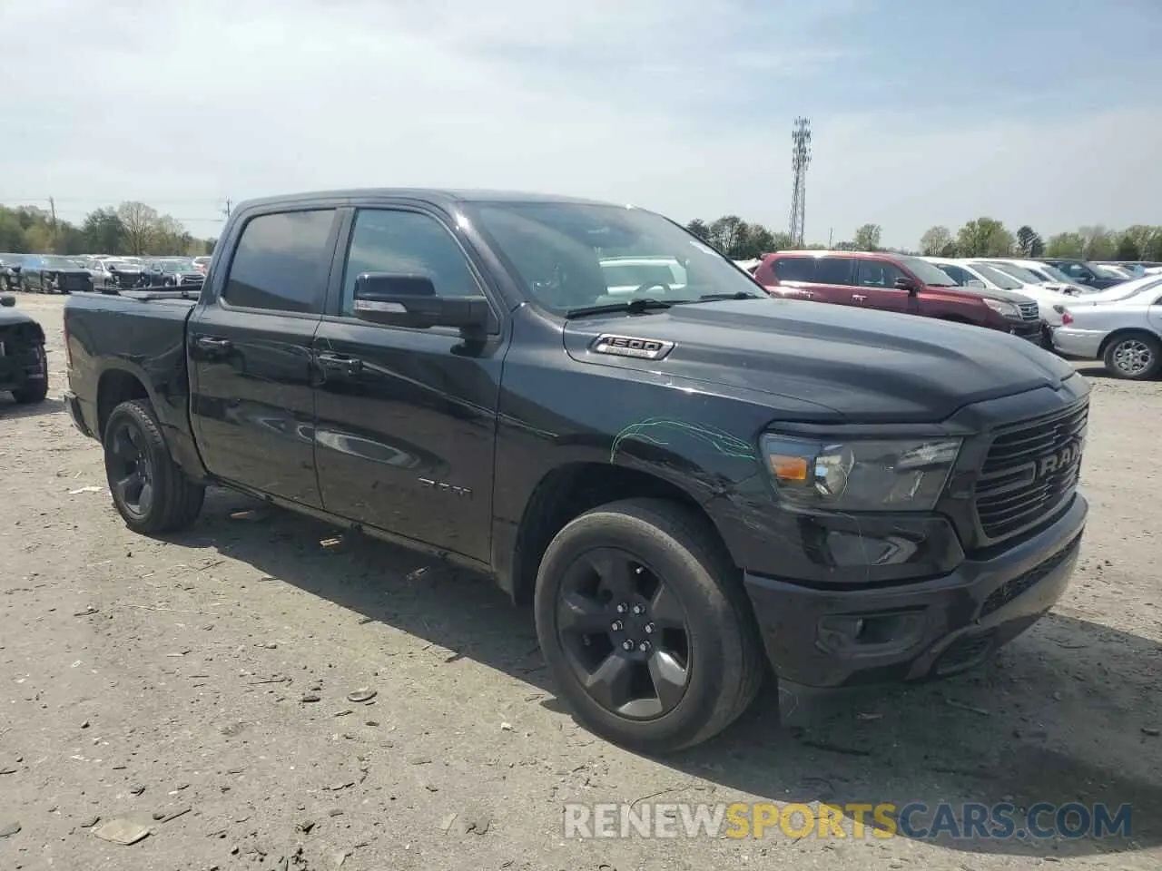4 Photograph of a damaged car 1C6SRFFT4KN899445 RAM 1500 2019