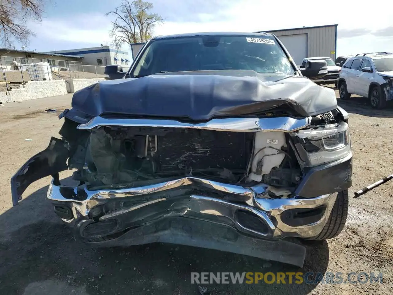 5 Photograph of a damaged car 1C6SRFFT5KN531601 RAM 1500 2019
