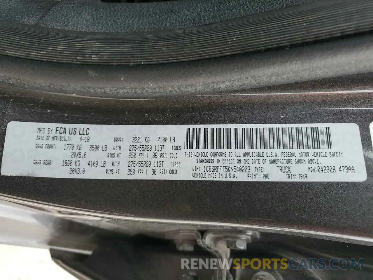 12 Photograph of a damaged car 1C6SRFFT5KN540203 RAM 1500 2019