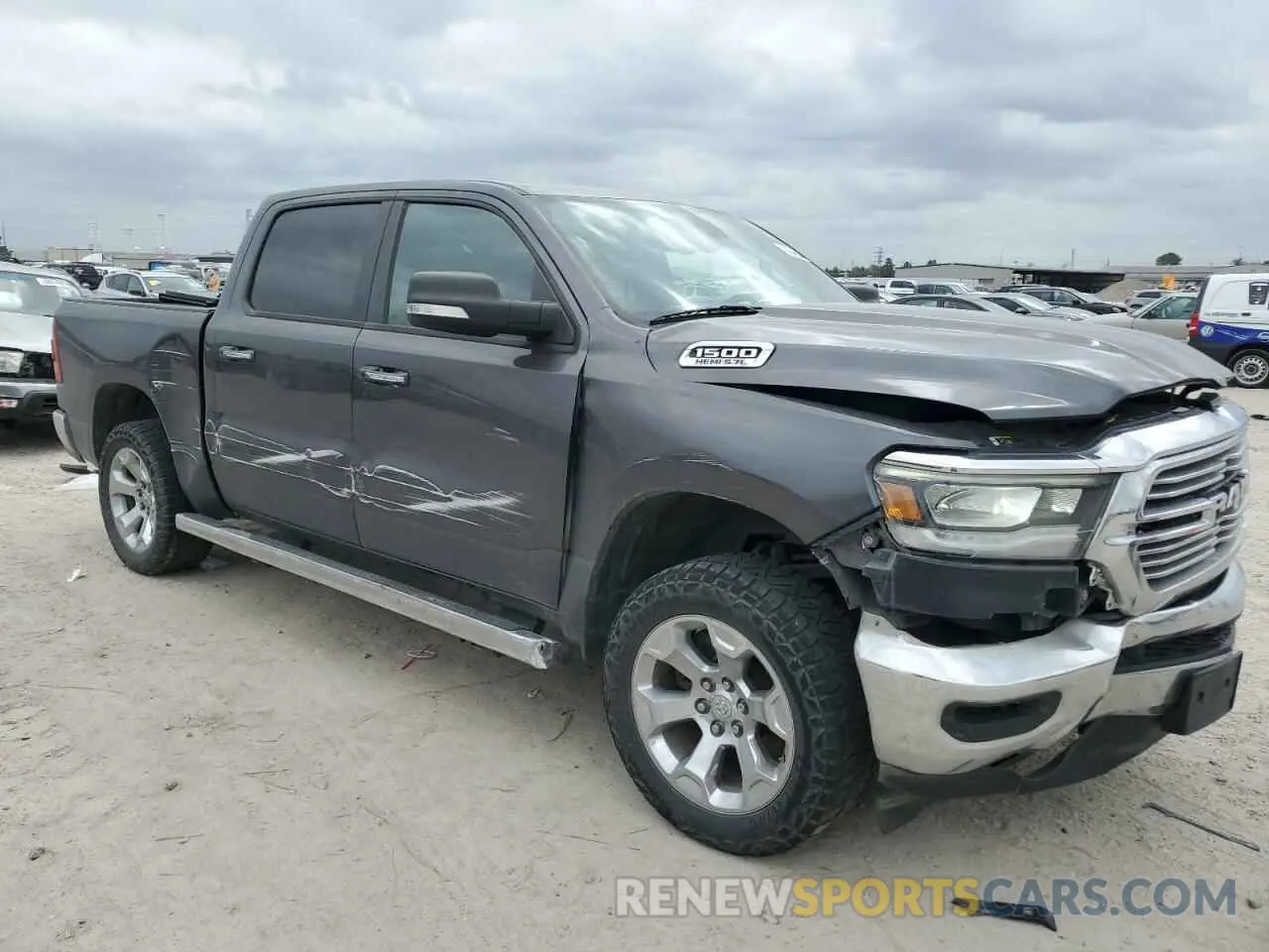 4 Photograph of a damaged car 1C6SRFFT5KN540203 RAM 1500 2019