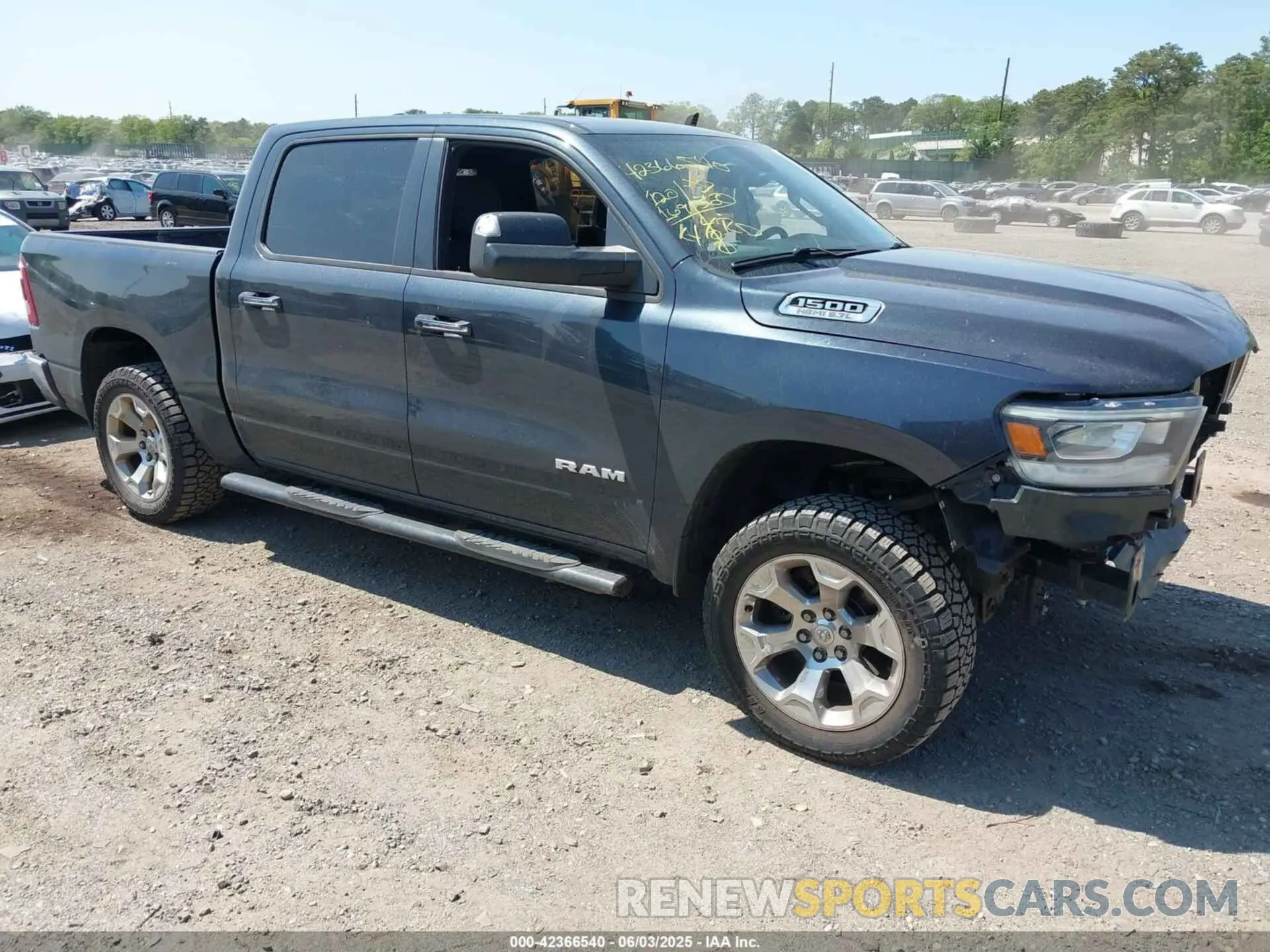 1 Photograph of a damaged car 1C6SRFFT5KN544445 RAM 1500 2019