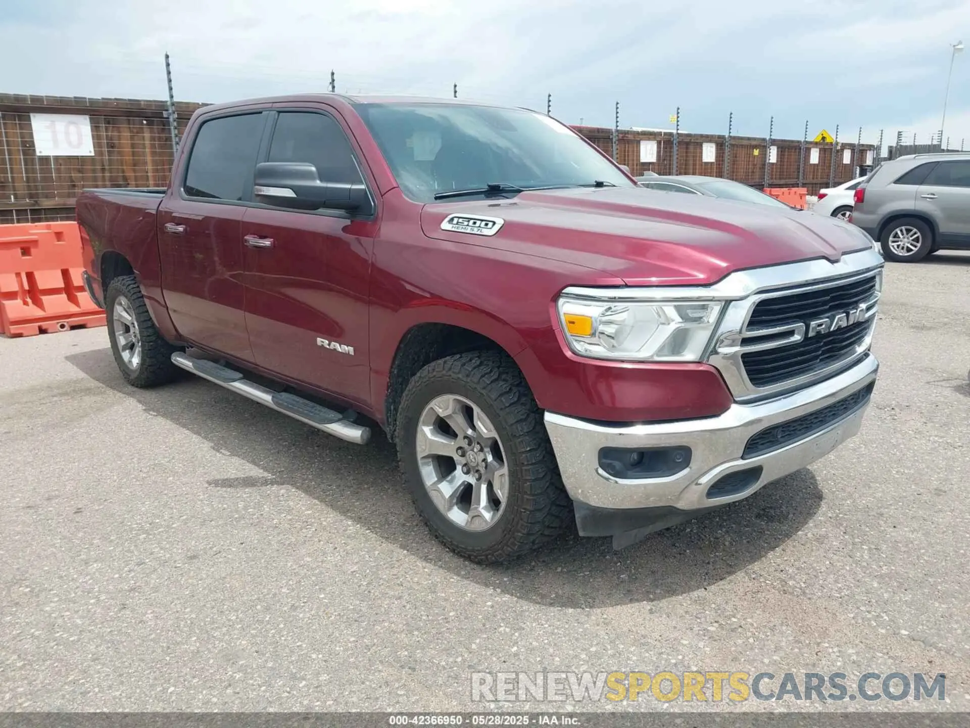 1 Photograph of a damaged car 1C6SRFFT5KN554148 RAM 1500 2019