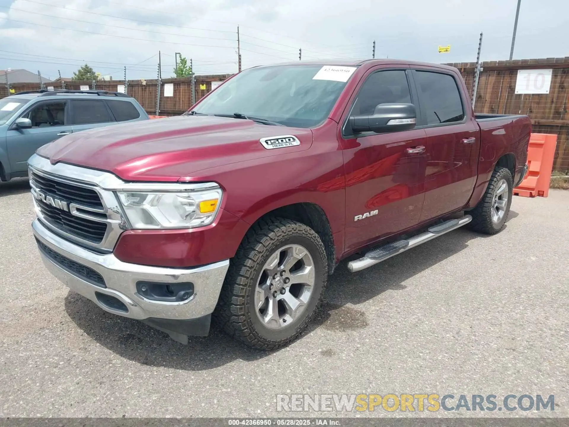 2 Photograph of a damaged car 1C6SRFFT5KN554148 RAM 1500 2019