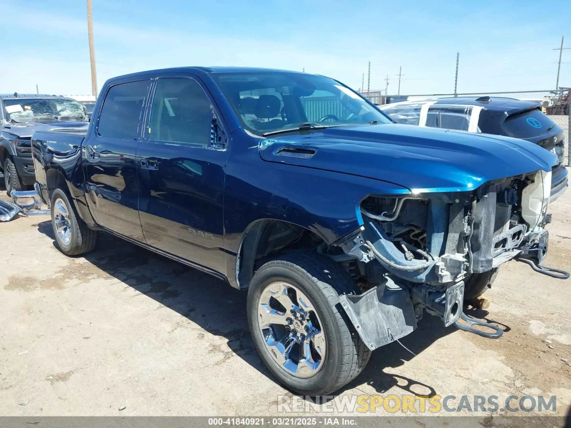 1 Photograph of a damaged car 1C6SRFFT5KN598456 RAM 1500 2019