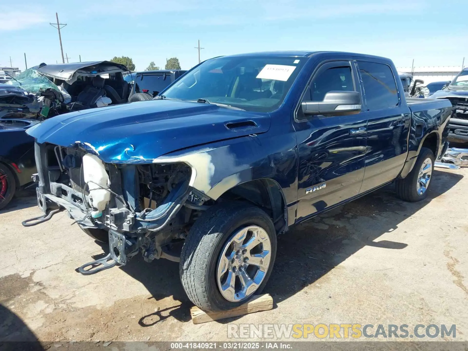 2 Photograph of a damaged car 1C6SRFFT5KN598456 RAM 1500 2019
