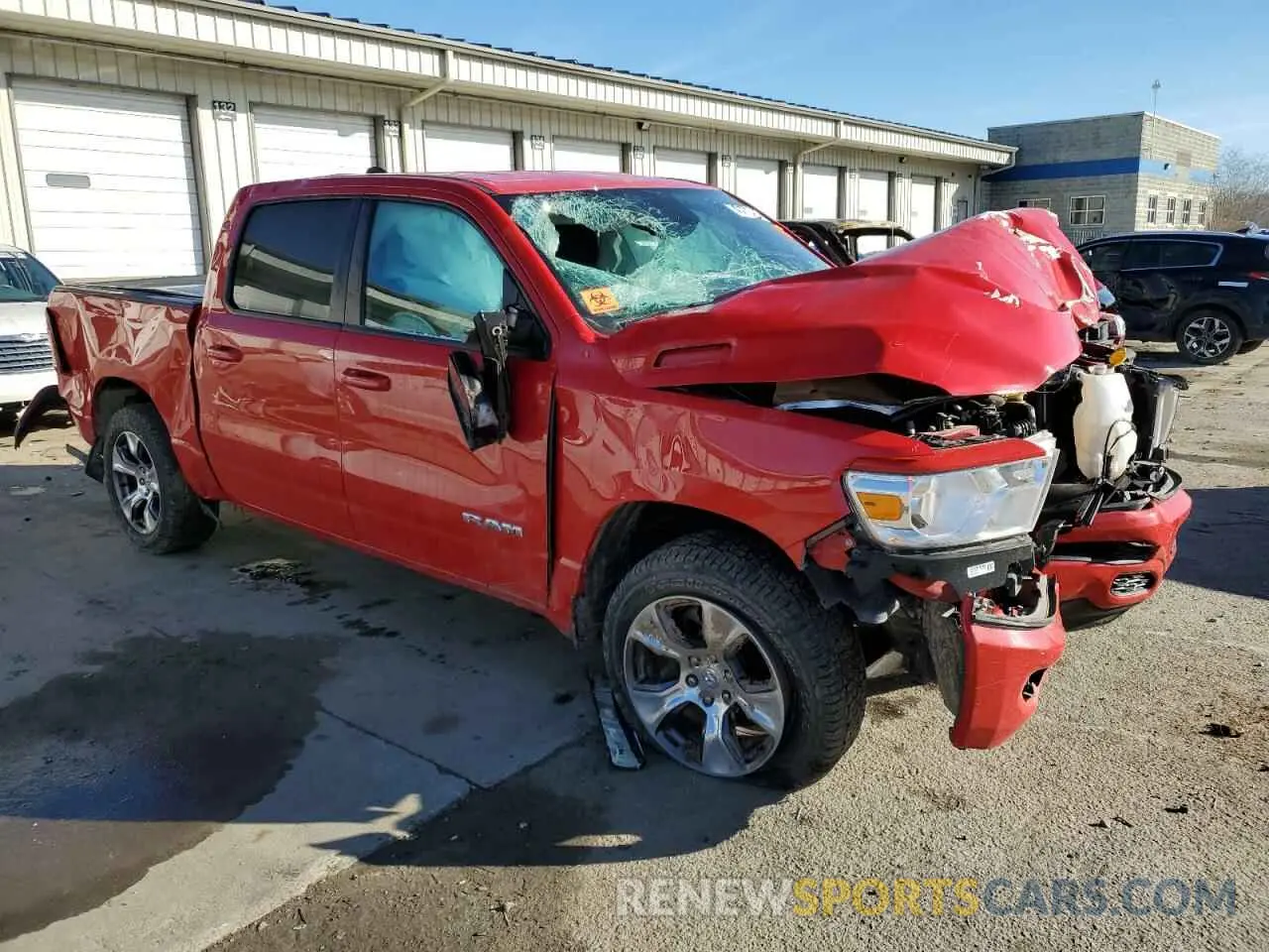 4 Photograph of a damaged car 1C6SRFFT5KN614090 RAM 1500 2019