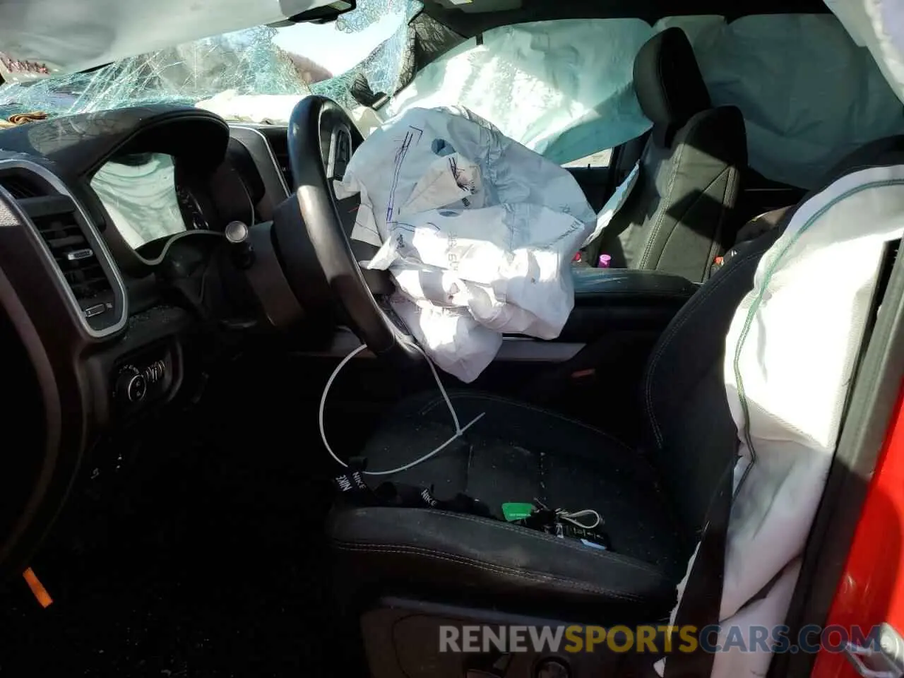 7 Photograph of a damaged car 1C6SRFFT5KN614090 RAM 1500 2019