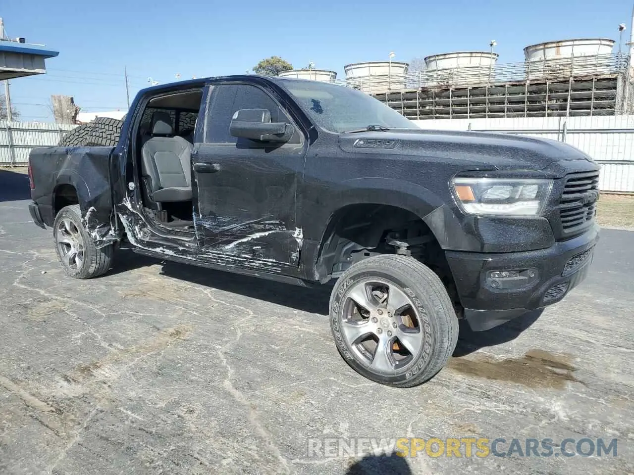 4 Photograph of a damaged car 1C6SRFFT5KN621556 RAM 1500 2019