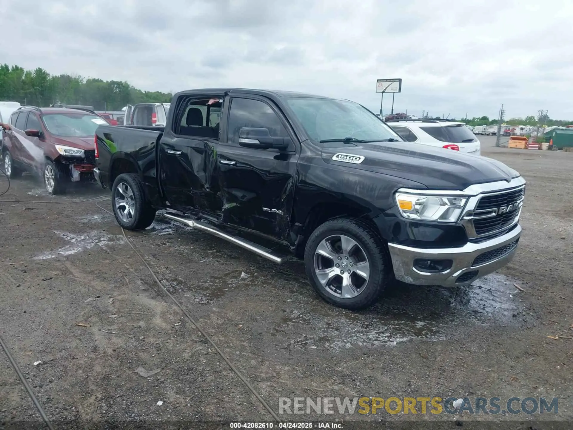 1 Photograph of a damaged car 1C6SRFFT5KN649664 RAM 1500 2019