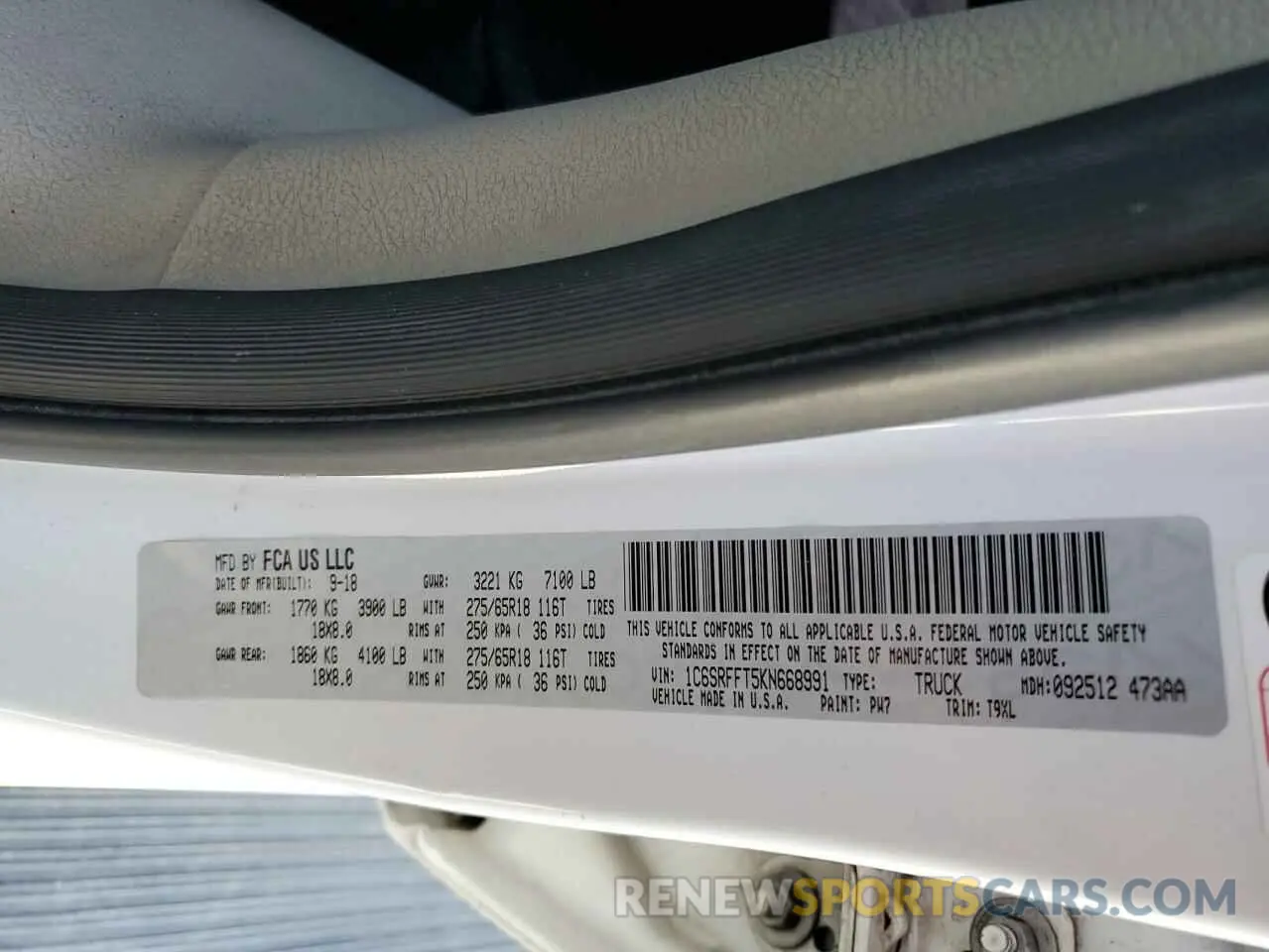 12 Photograph of a damaged car 1C6SRFFT5KN668991 RAM 1500 2019