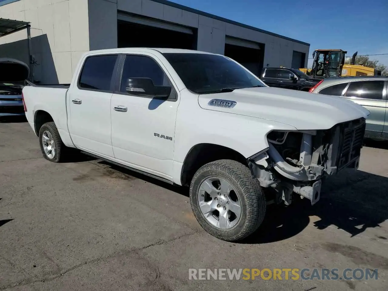 4 Photograph of a damaged car 1C6SRFFT5KN668991 RAM 1500 2019
