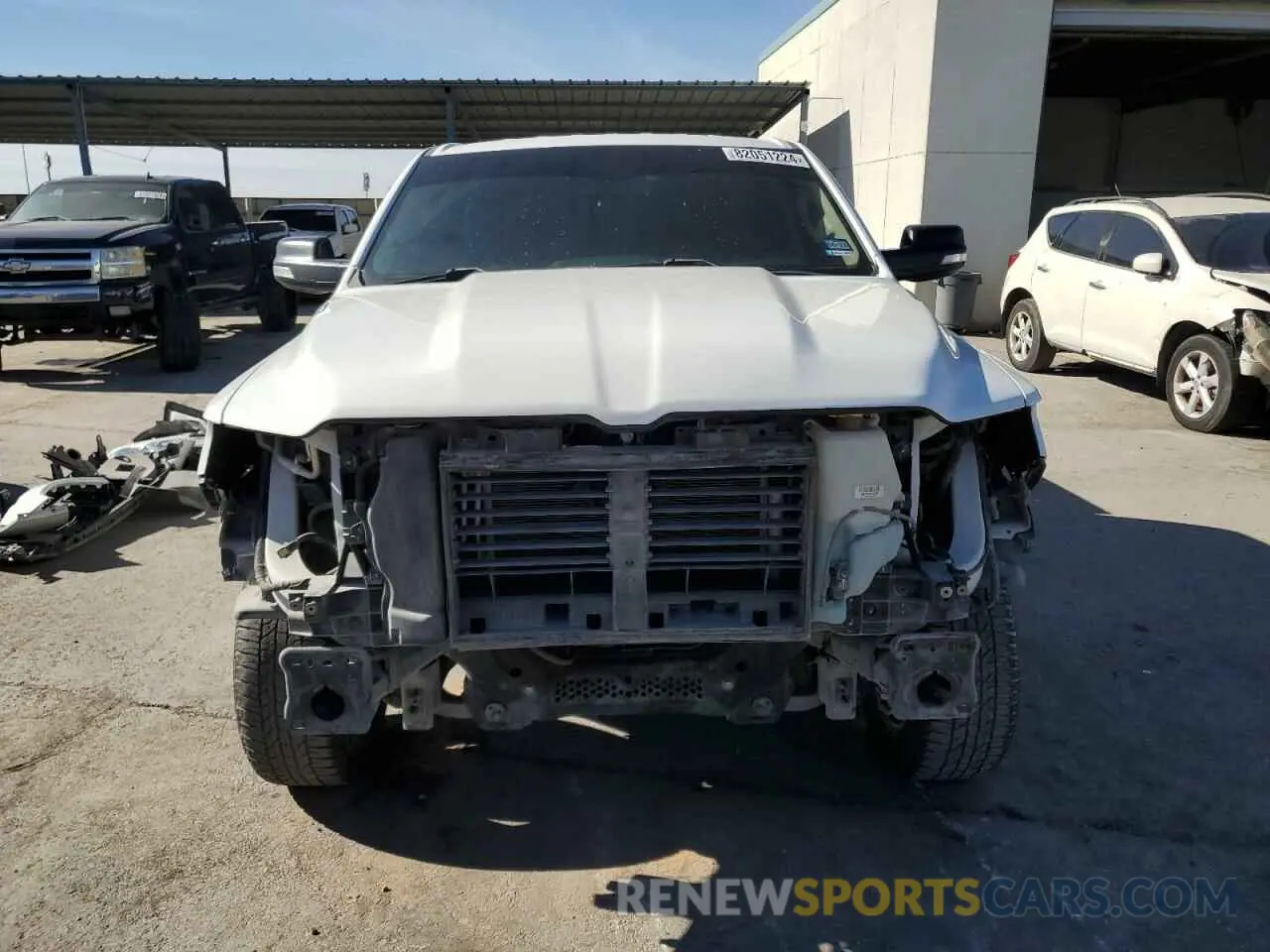5 Photograph of a damaged car 1C6SRFFT5KN668991 RAM 1500 2019