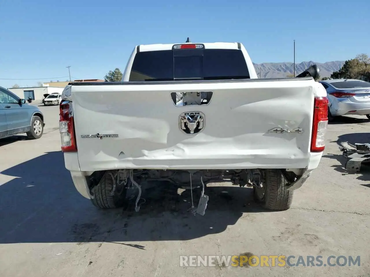 6 Photograph of a damaged car 1C6SRFFT5KN668991 RAM 1500 2019