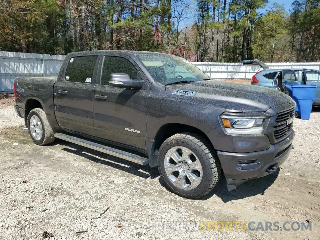 4 Photograph of a damaged car 1C6SRFFT5KN882850 RAM 1500 2019