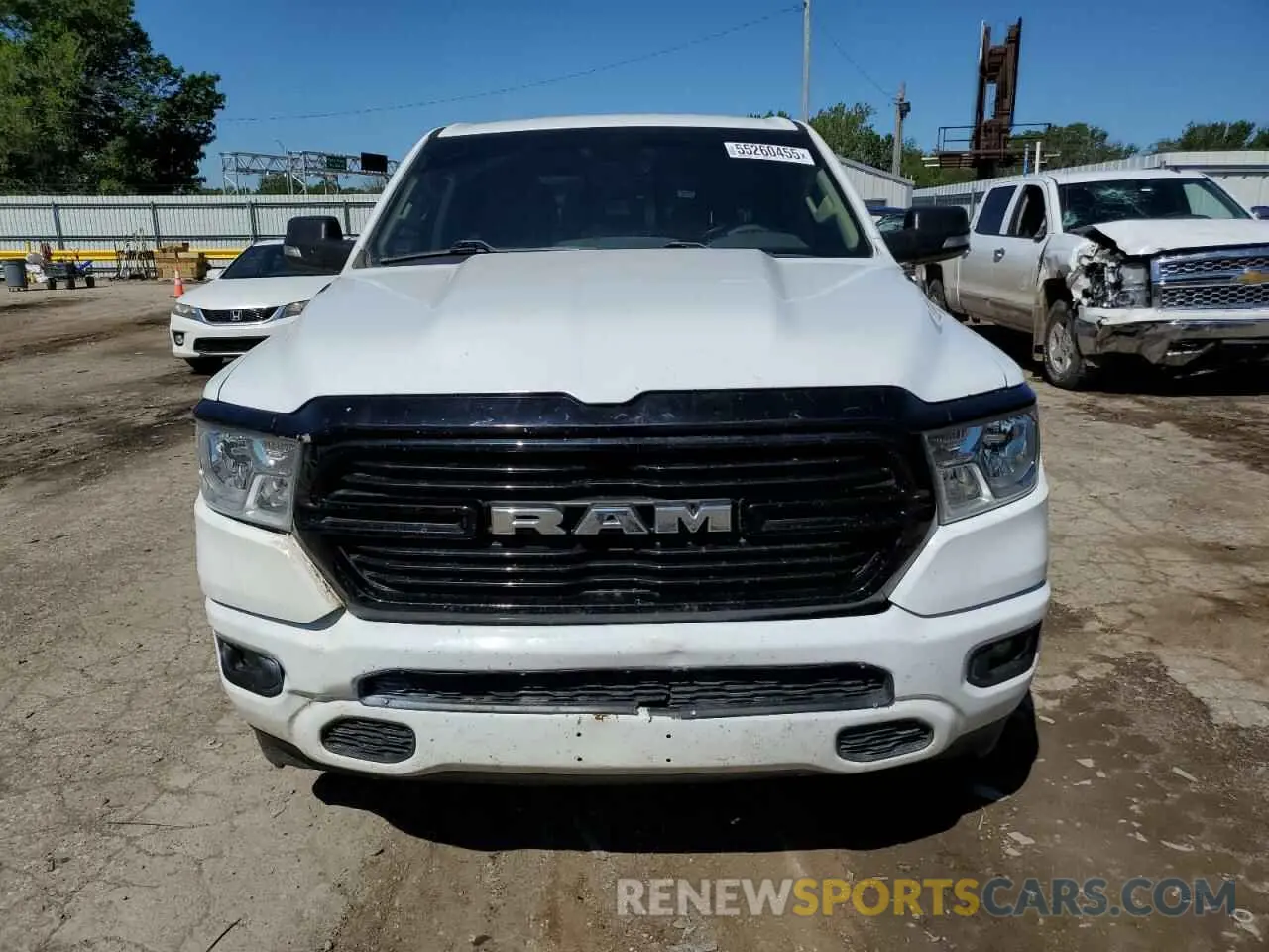5 Photograph of a damaged car 1C6SRFFT5KN910792 RAM 1500 2019