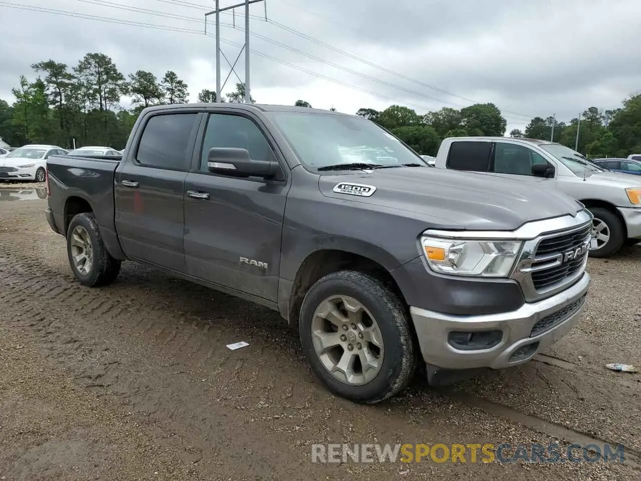 4 Photograph of a damaged car 1C6SRFFT6KN539304 RAM 1500 2019