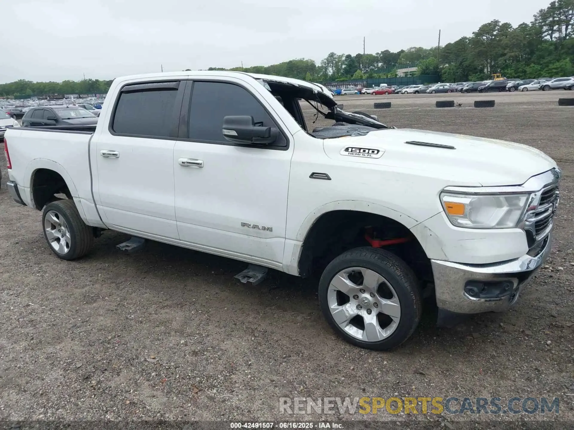 1 Photograph of a damaged car 1C6SRFFT6KN587871 RAM 1500 2019
