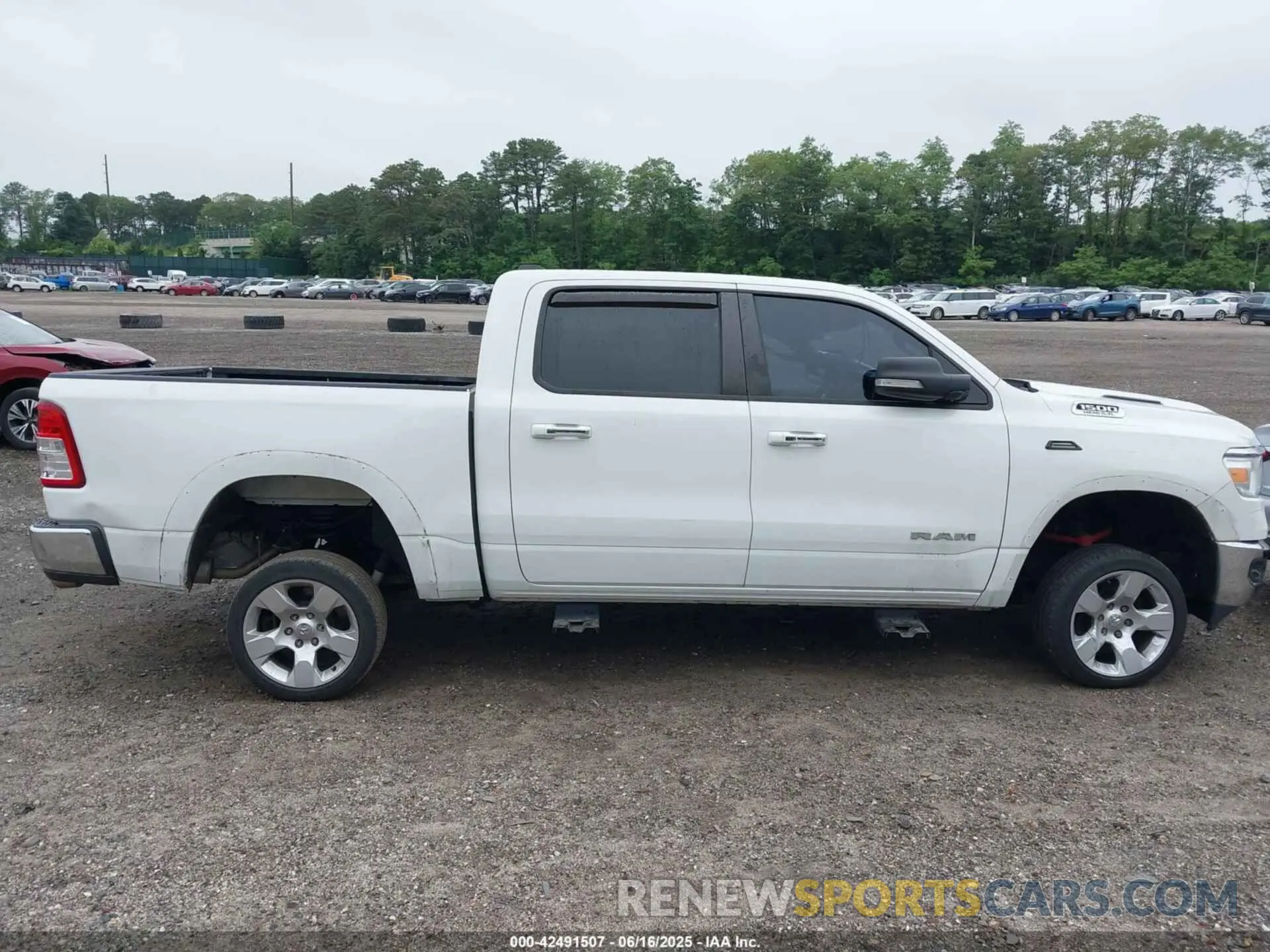 13 Photograph of a damaged car 1C6SRFFT6KN587871 RAM 1500 2019