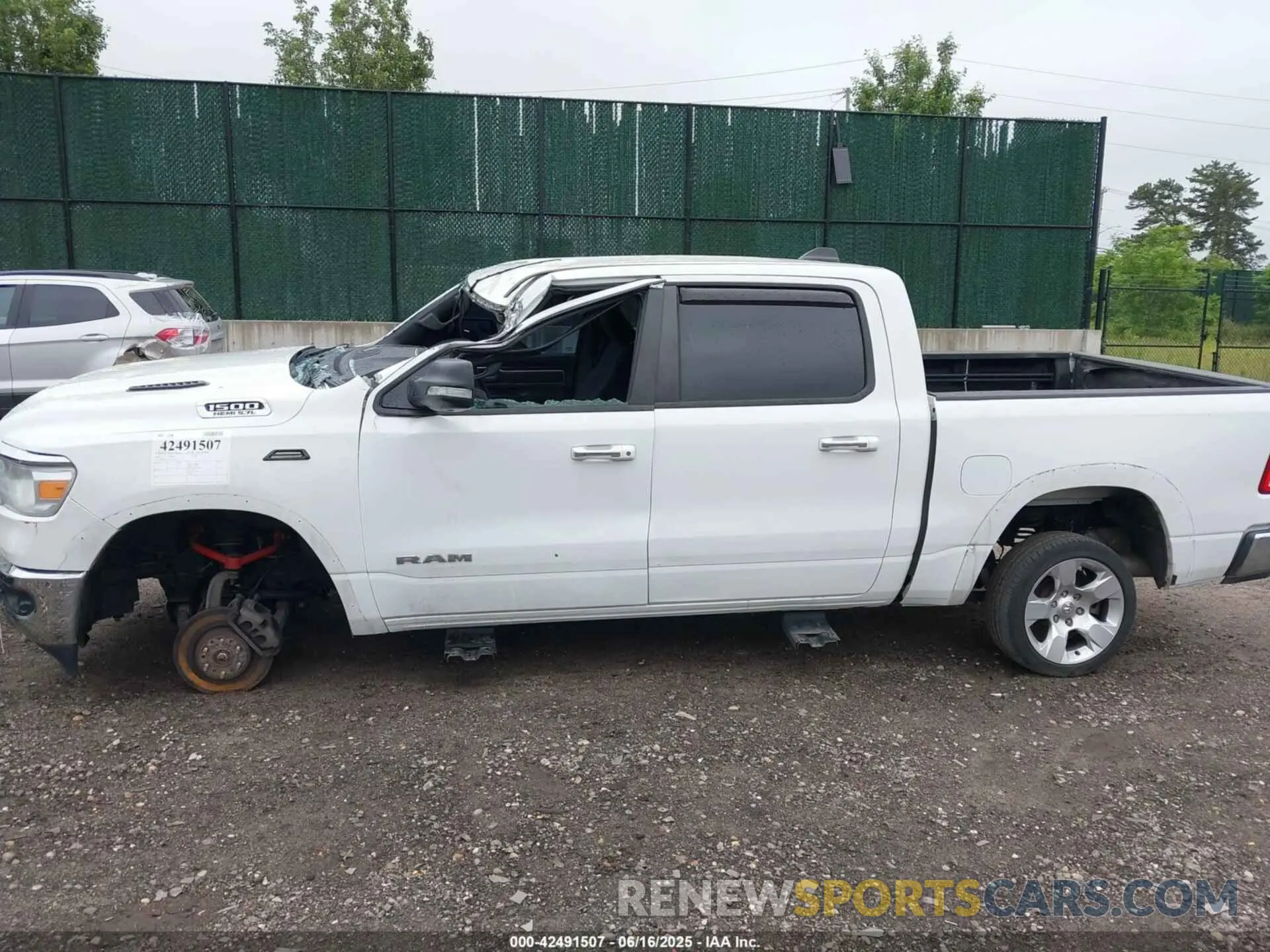 14 Photograph of a damaged car 1C6SRFFT6KN587871 RAM 1500 2019