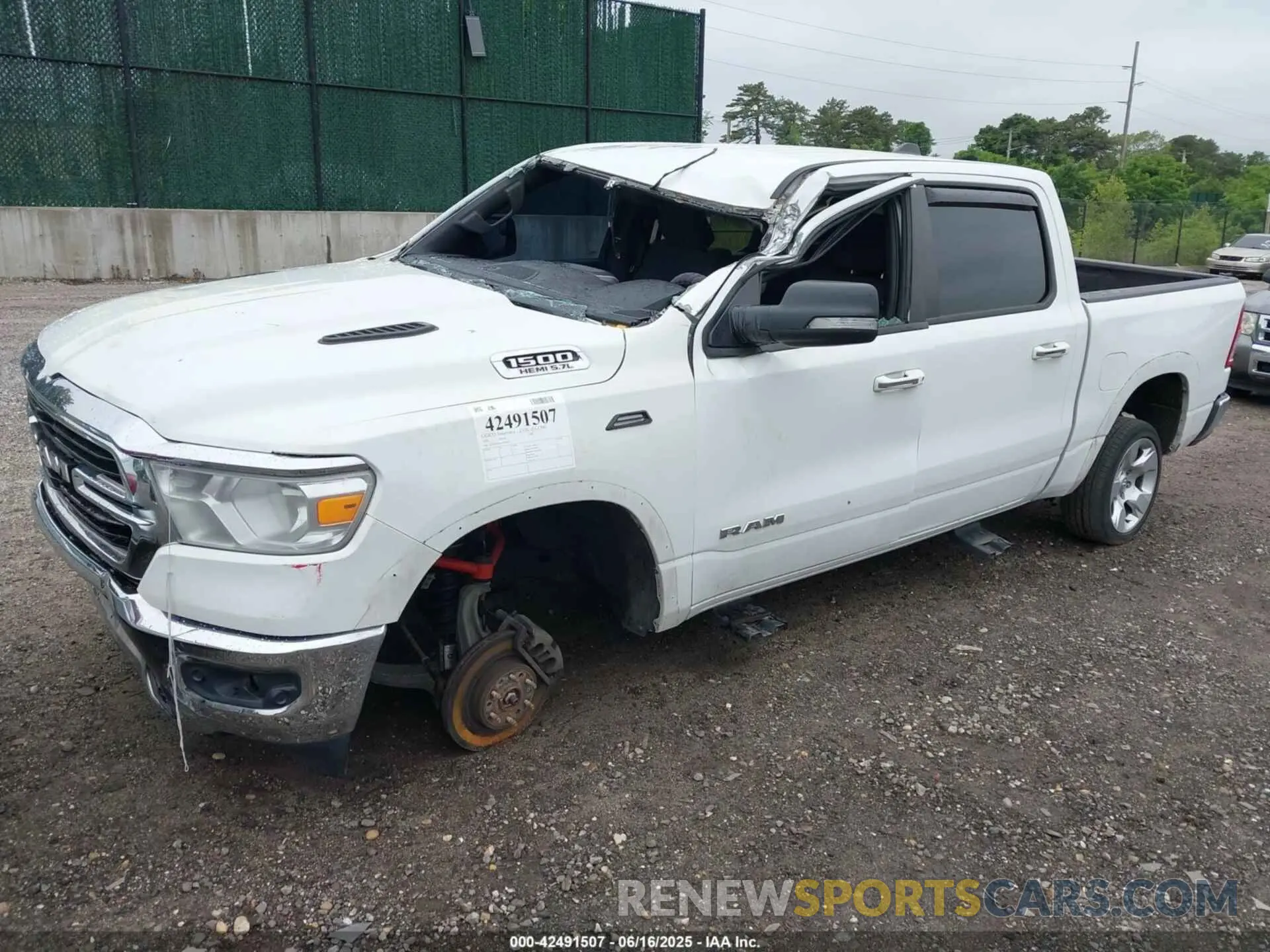 2 Photograph of a damaged car 1C6SRFFT6KN587871 RAM 1500 2019