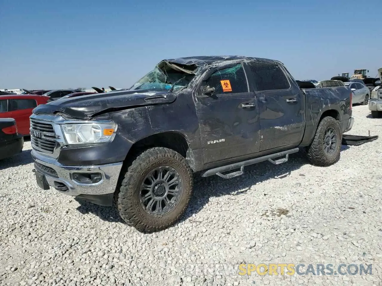 1 Photograph of a damaged car 1C6SRFFT6KN600666 RAM 1500 2019