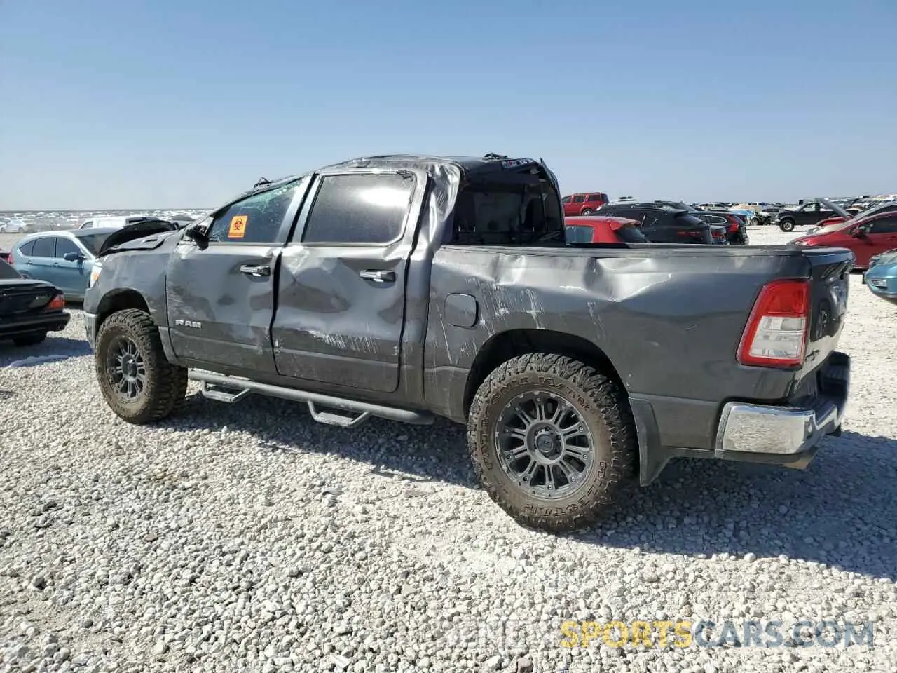 2 Photograph of a damaged car 1C6SRFFT6KN600666 RAM 1500 2019