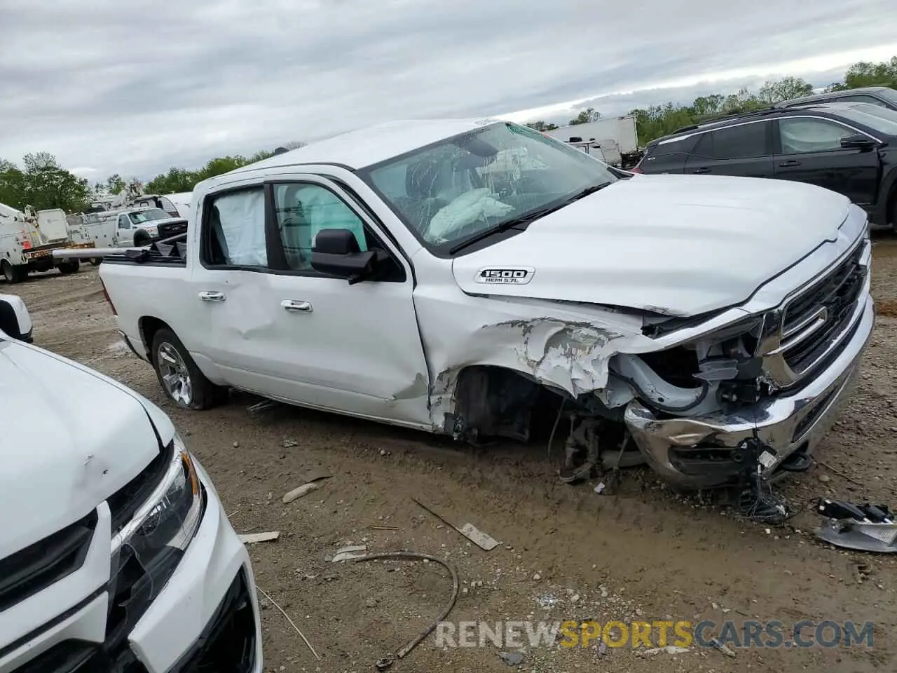 4 Photograph of a damaged car 1C6SRFFT6KN603812 RAM 1500 2019