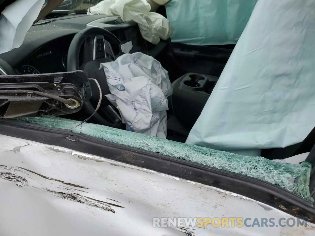 7 Photograph of a damaged car 1C6SRFFT6KN603812 RAM 1500 2019
