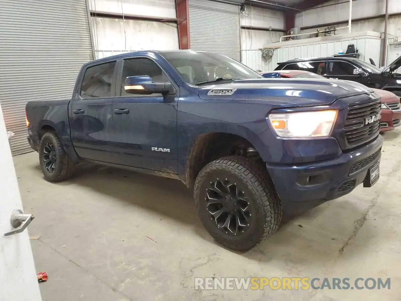 4 Photograph of a damaged car 1C6SRFFT6KN622358 RAM 1500 2019