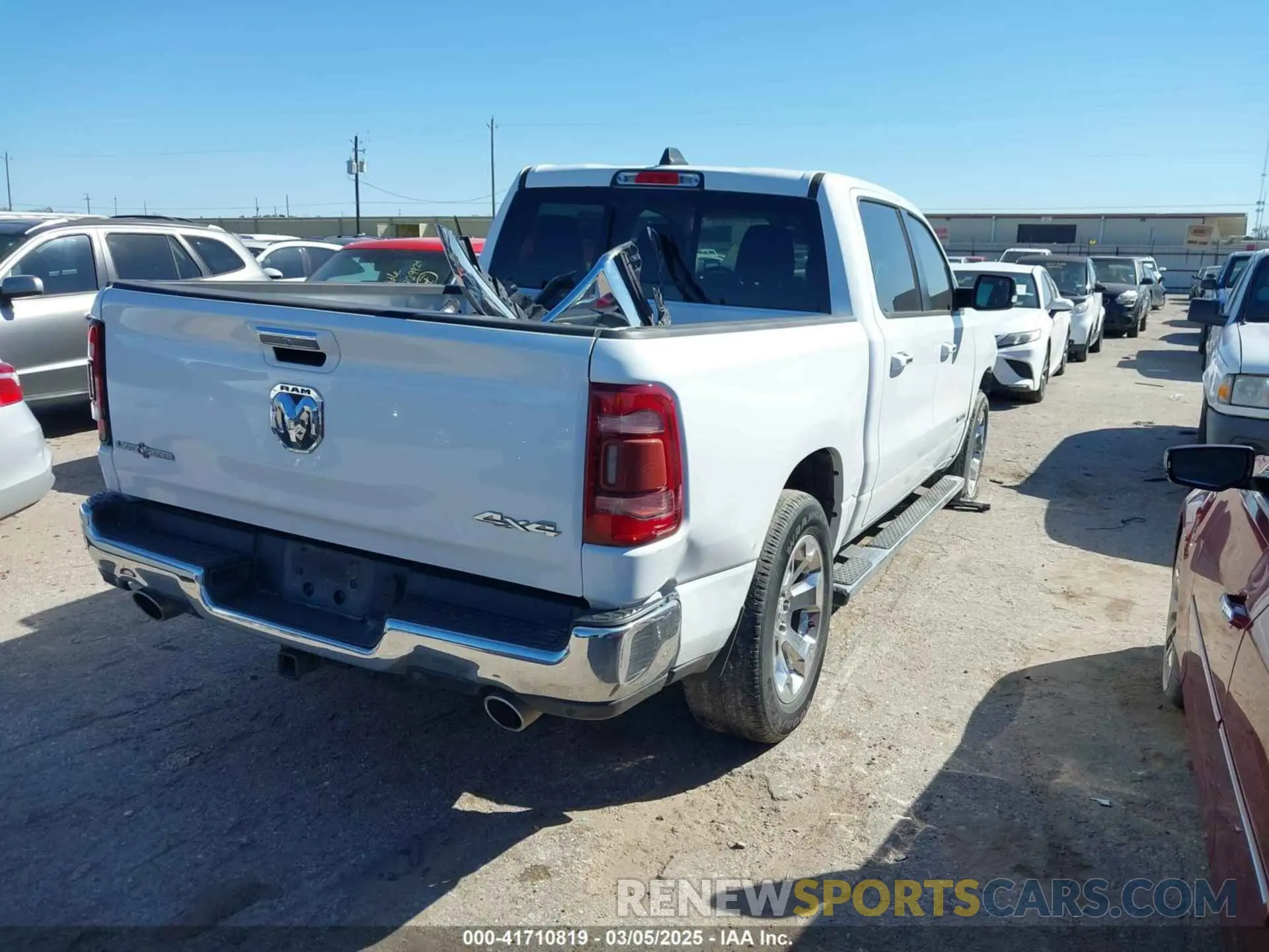 4 Photograph of a damaged car 1C6SRFFT6KN627320 RAM 1500 2019