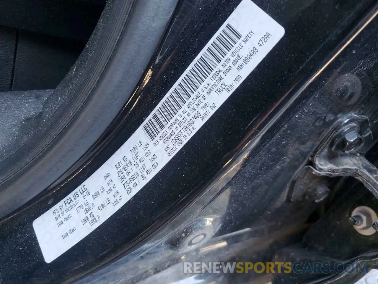 12 Photograph of a damaged car 1C6SRFFT6KN637409 RAM 1500 2019