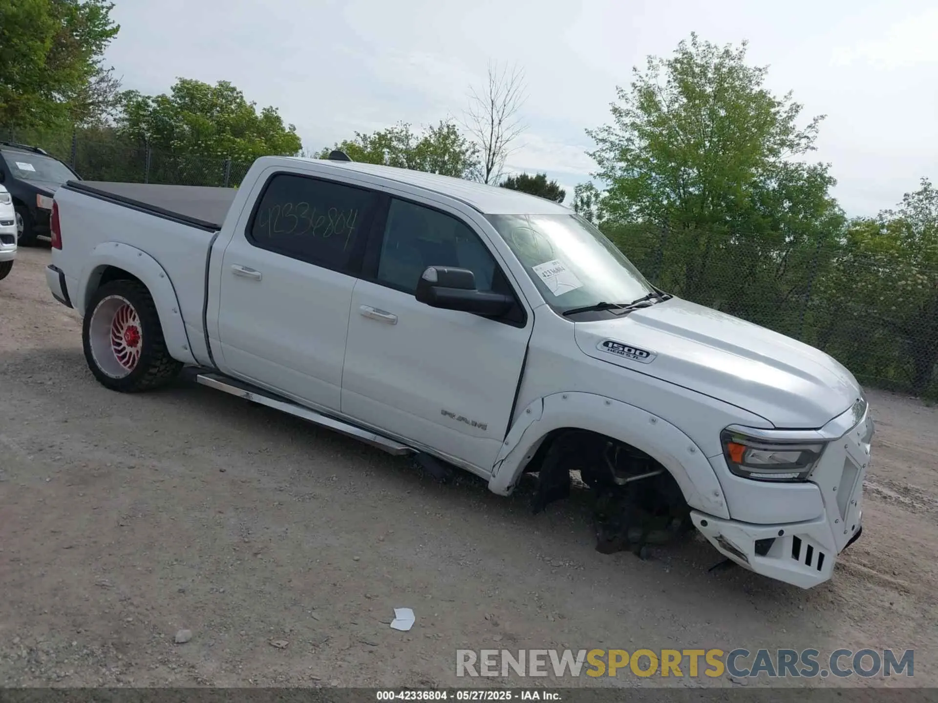 1 Photograph of a damaged car 1C6SRFFT6KN660091 RAM 1500 2019