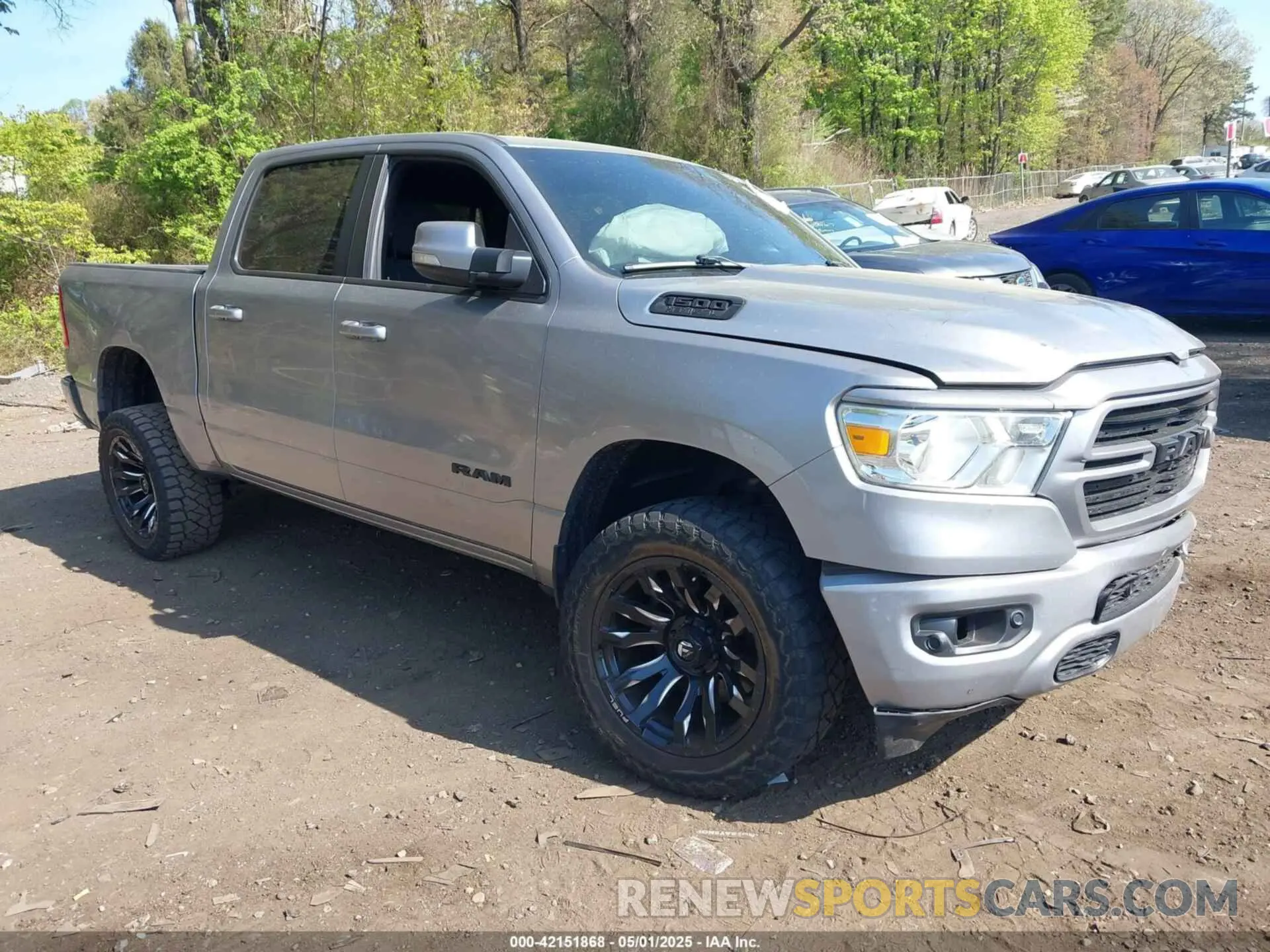 1 Photograph of a damaged car 1C6SRFFT6KN733556 RAM 1500 2019