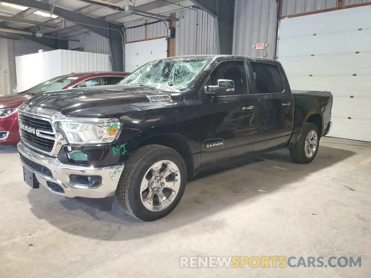 1 Photograph of a damaged car 1C6SRFFT6KN802438 RAM 1500 2019