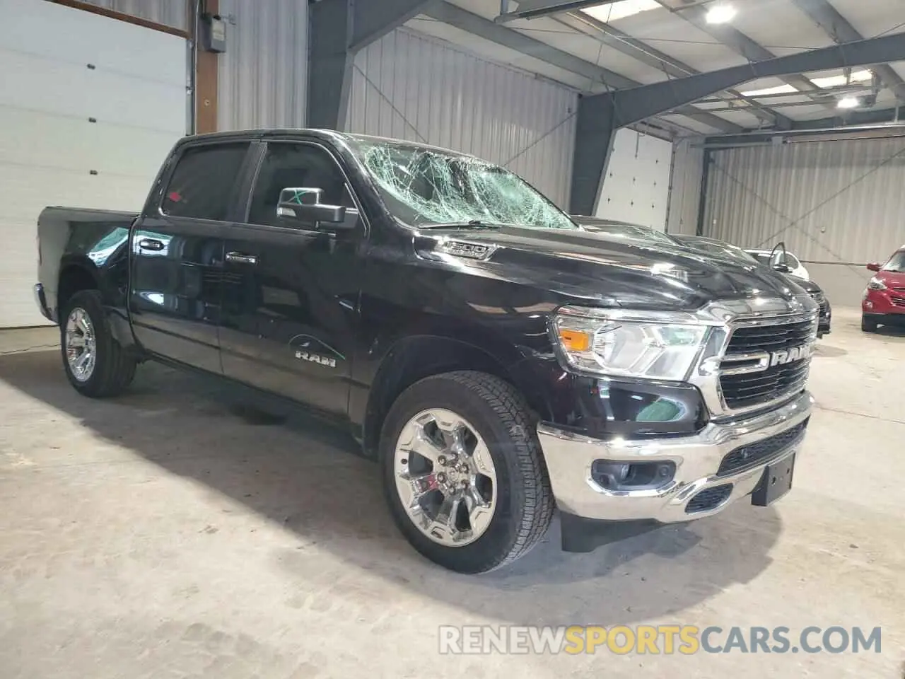 4 Photograph of a damaged car 1C6SRFFT6KN802438 RAM 1500 2019