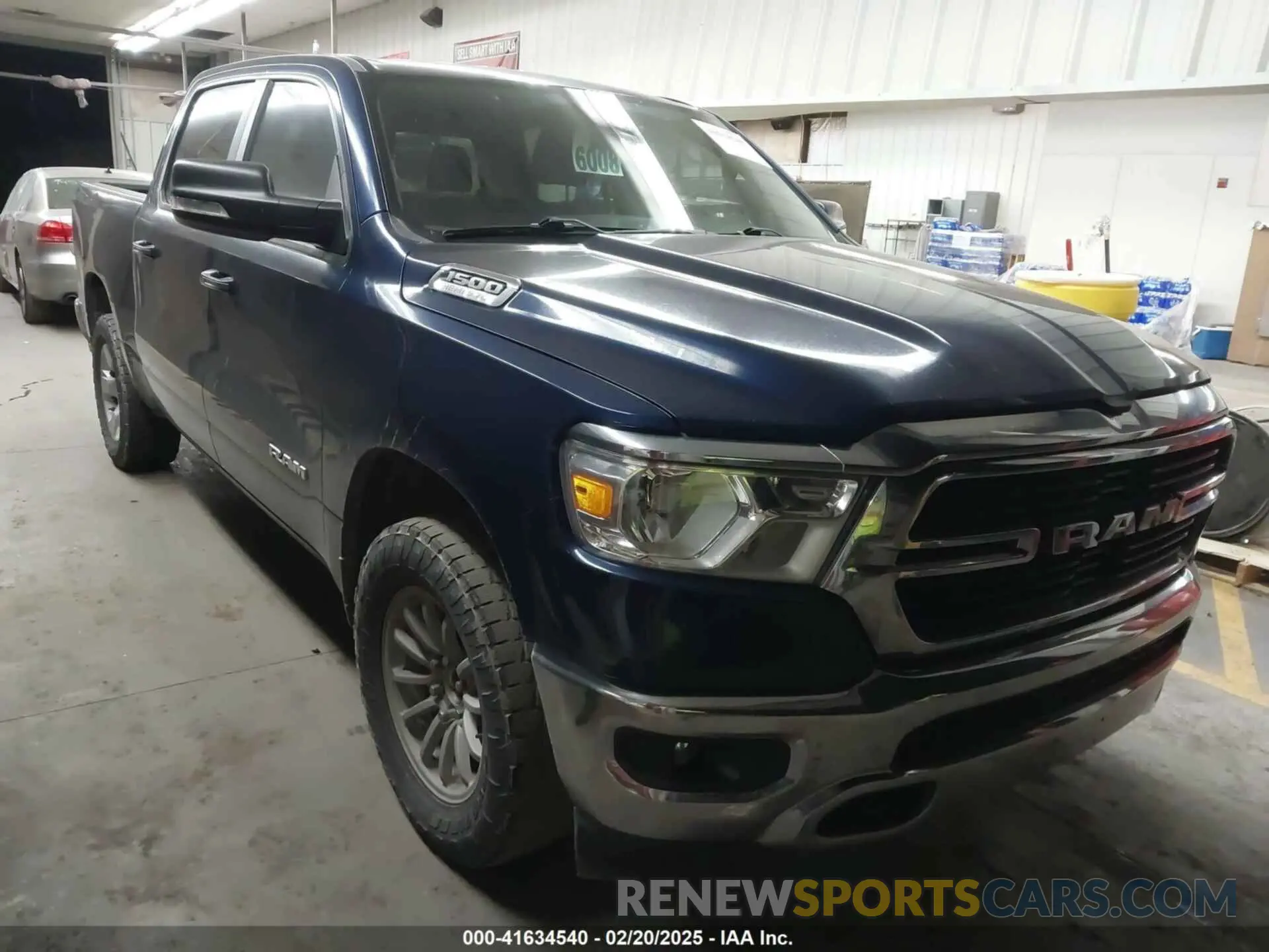 1 Photograph of a damaged car 1C6SRFFT6KN811902 RAM 1500 2019