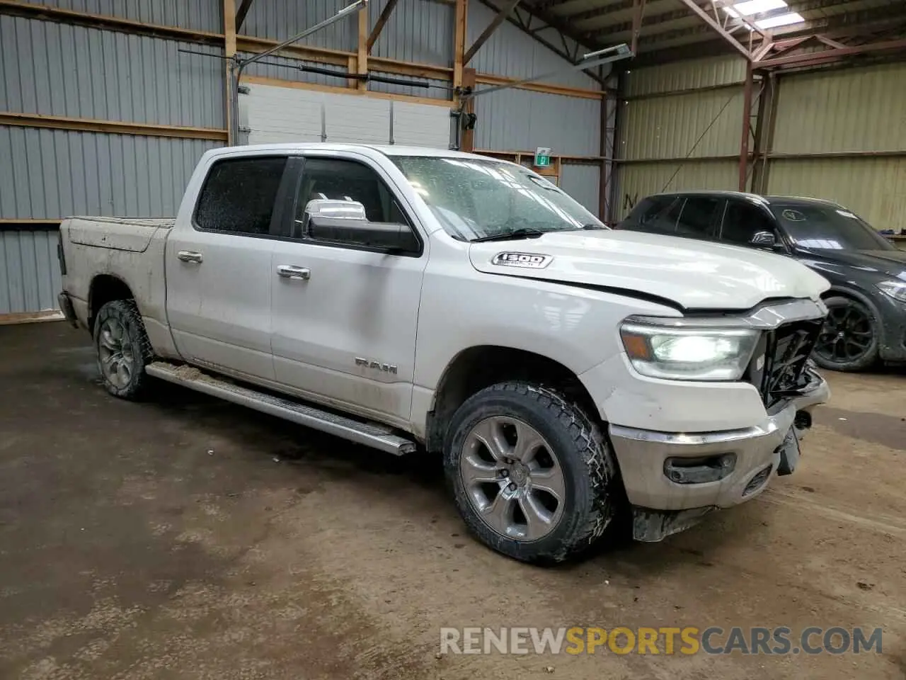 4 Photograph of a damaged car 1C6SRFFT6KN867628 RAM 1500 2019
