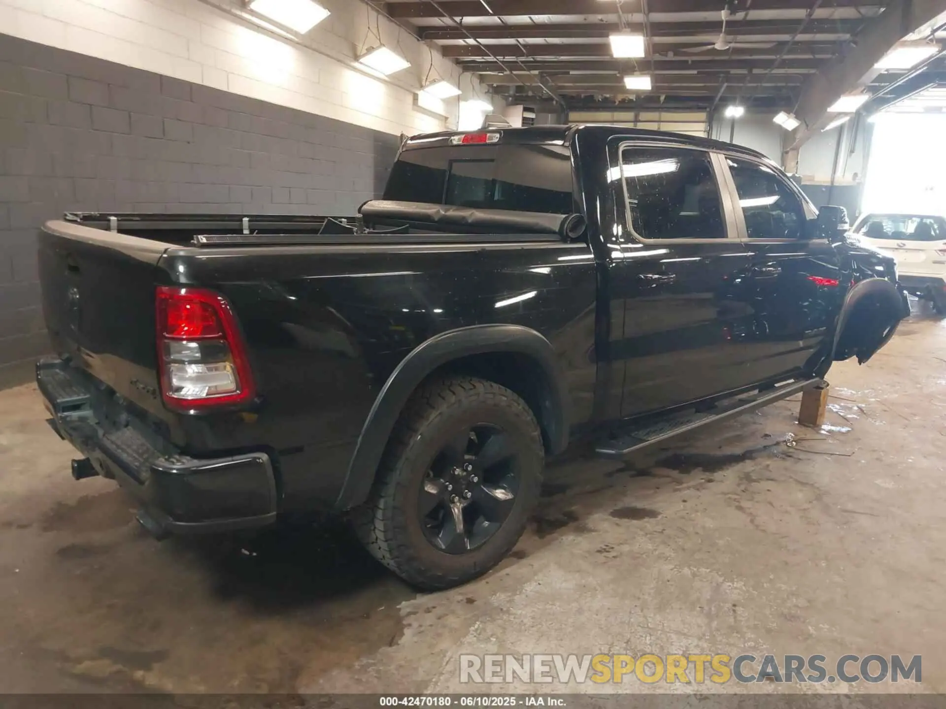 4 Photograph of a damaged car 1C6SRFFT6KN890780 RAM 1500 2019