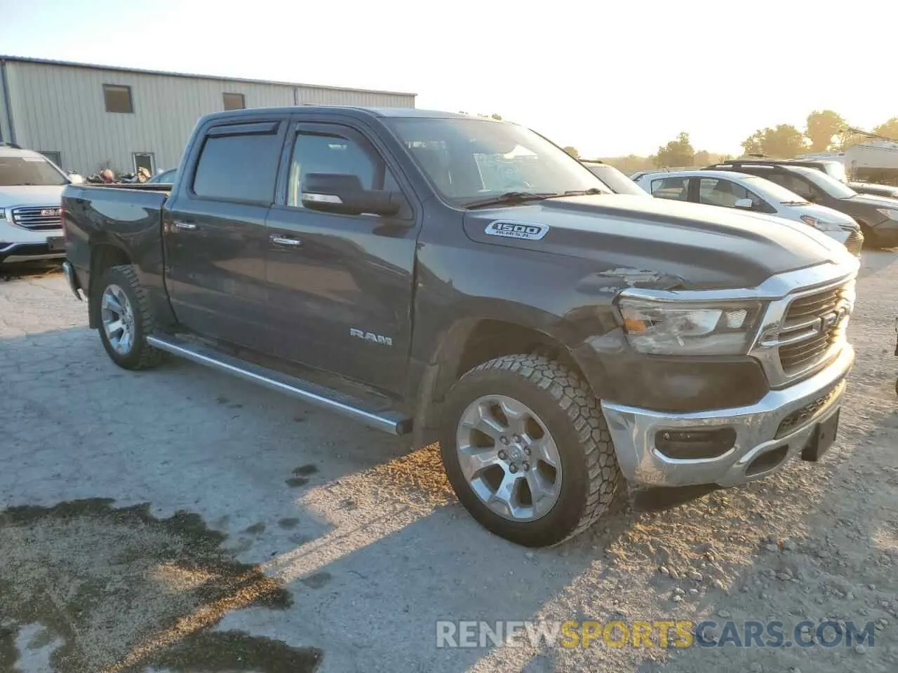 4 Photograph of a damaged car 1C6SRFFT7KN535777 RAM 1500 2019