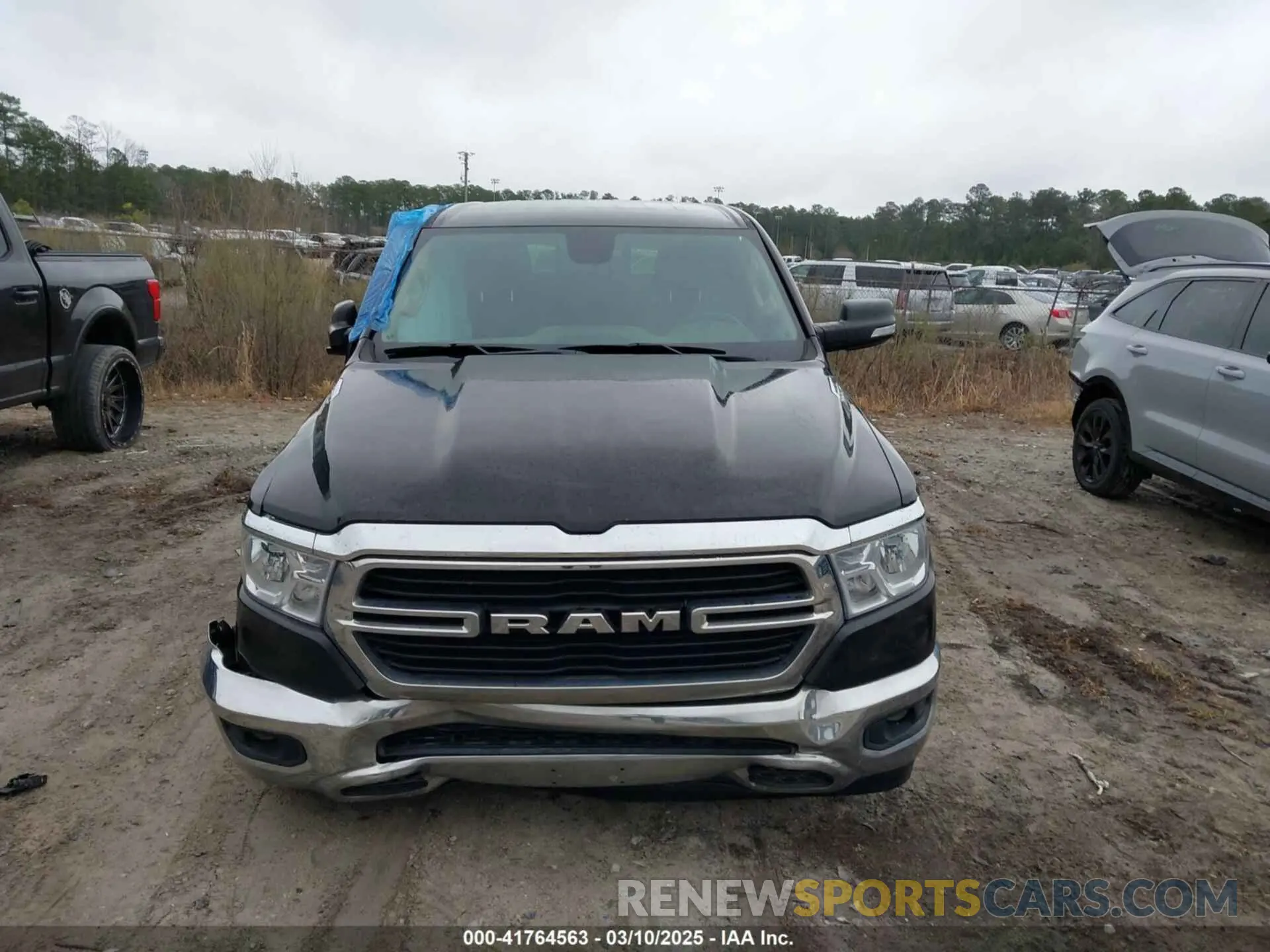 12 Photograph of a damaged car 1C6SRFFT7KN589502 RAM 1500 2019
