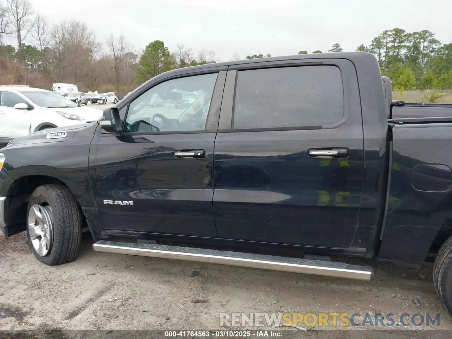14 Photograph of a damaged car 1C6SRFFT7KN589502 RAM 1500 2019