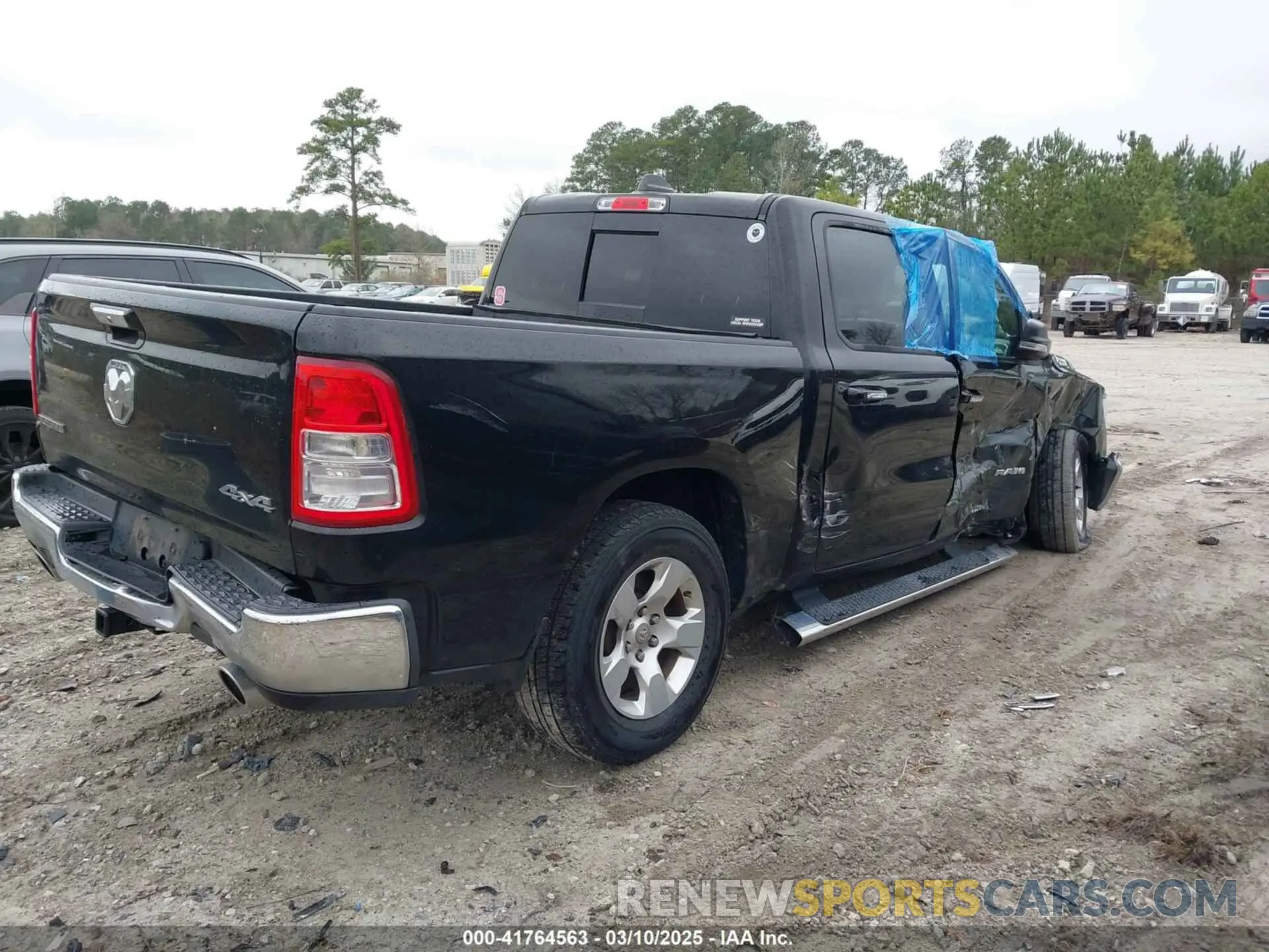 4 Photograph of a damaged car 1C6SRFFT7KN589502 RAM 1500 2019
