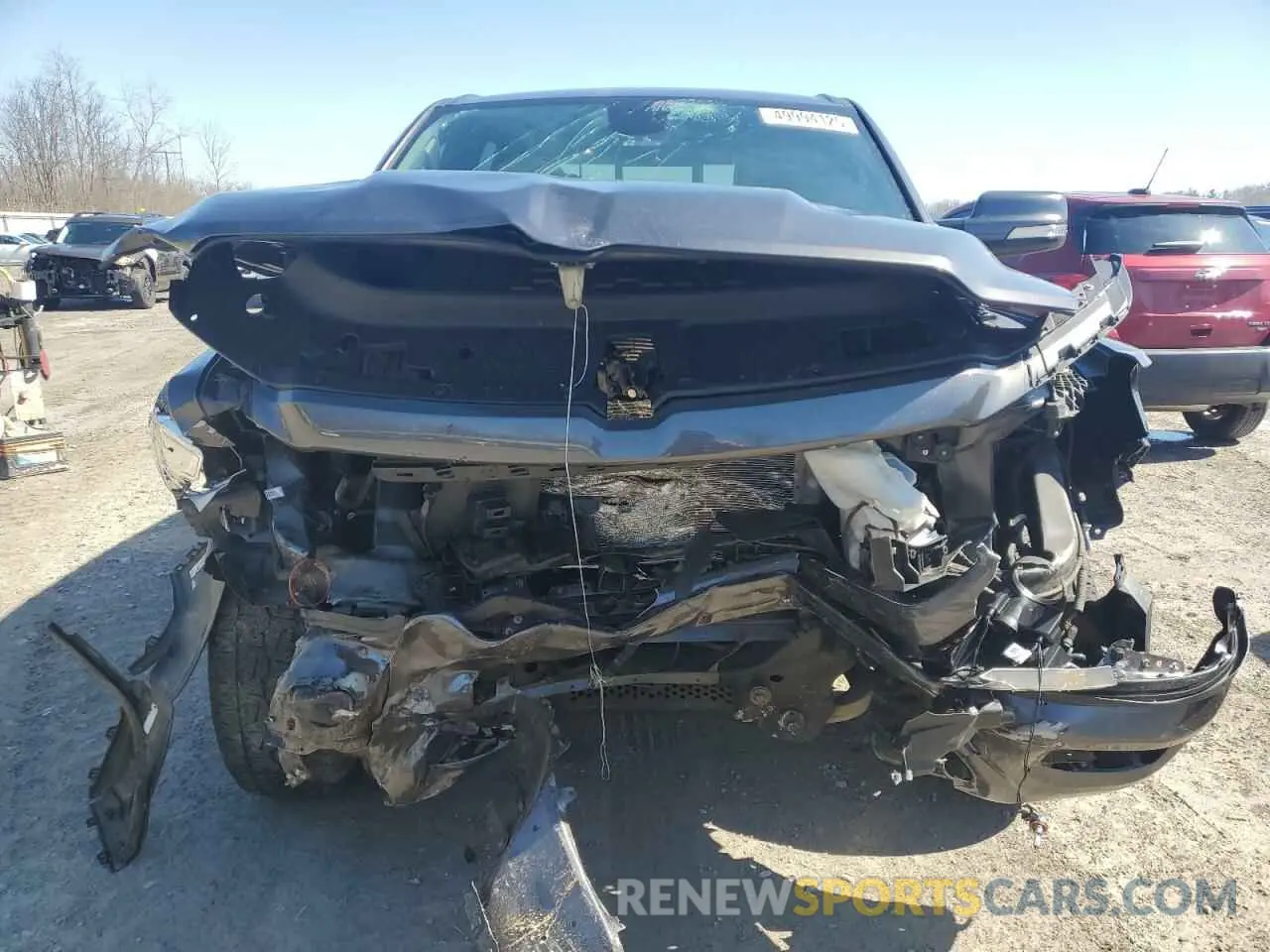 5 Photograph of a damaged car 1C6SRFFT7KN658835 RAM 1500 2019